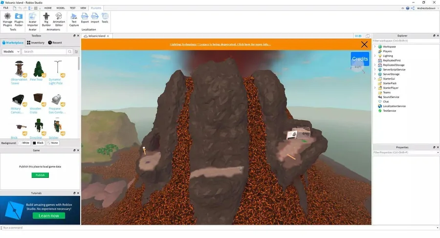 Окно Roblox Studio: вулканический ландшафт с потоками лавы, слева библиотека готовых объектов